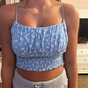 White tank cropped from PacSun